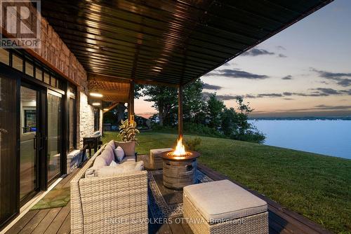 Walkout Covered Patio - 5 Shoreside Way, Augusta, ON - Outdoor With Body Of Water With Deck Patio Veranda
