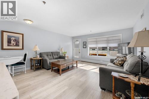 207 205 Mcintyre Street, Regina, SK - Indoor Photo Showing Living Room