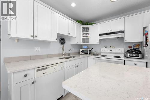 207 205 Mcintyre Street, Regina, SK - Indoor Photo Showing Kitchen With Double Sink