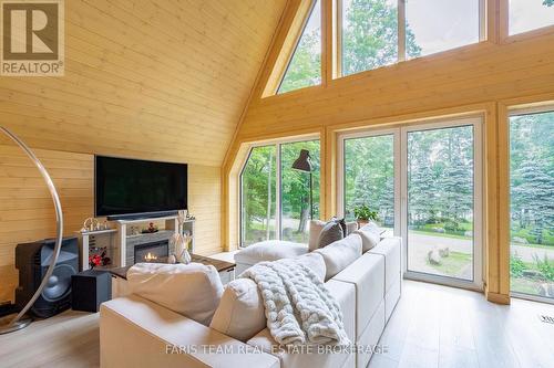 1490 Champlain Road, Tiny, ON - Indoor Photo Showing Living Room With Fireplace