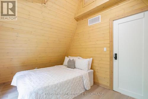 1490 Champlain Road, Tiny, ON - Indoor Photo Showing Bedroom