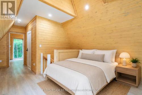 Virtually Staged - 1490 Champlain Road, Tiny, ON - Indoor Photo Showing Bedroom