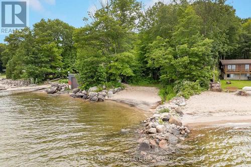 1490 Champlain Road, Tiny, ON - Outdoor With Body Of Water