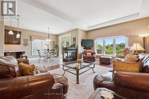 70 Bathgate Drive, Guelph (Kortright East), ON - Indoor Photo Showing Living Room With Fireplace