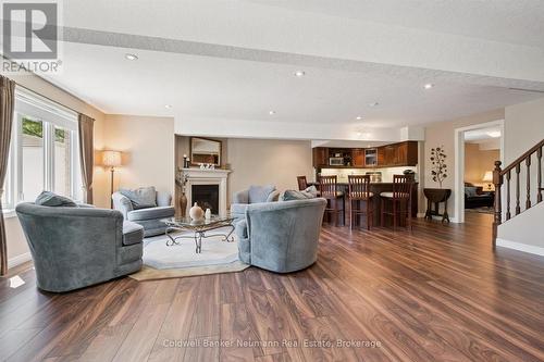 70 Bathgate Drive, Guelph (Kortright East), ON - Indoor Photo Showing Living Room With Fireplace