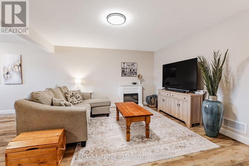 2391 Watson Crescent, Cornwall, ON - Indoor Photo Showing Living Room With Fireplace