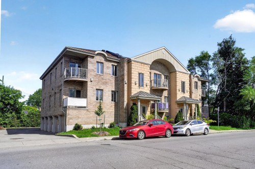 Front of Structure - 202-4195 Ch. Du Souvenir, Laval (Chomedey), QC - Outdoor With Facade