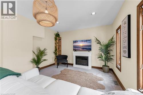 266 London Street S, Hamilton, ON - Indoor Photo Showing Bedroom With Fireplace