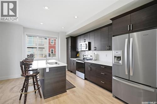 618 701 Meadows Boulevard, Saskatoon, SK - Indoor Photo Showing Kitchen