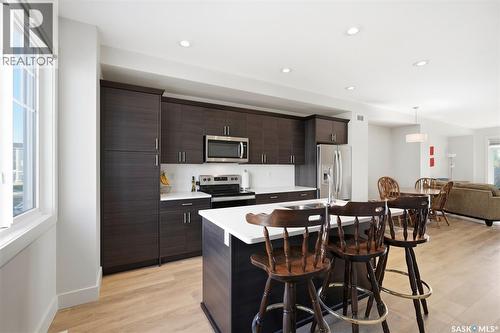 618 701 Meadows Boulevard, Saskatoon, SK - Indoor Photo Showing Kitchen With Double Sink