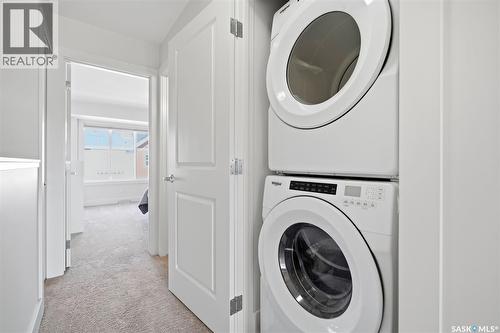 618 701 Meadows Boulevard, Saskatoon, SK - Indoor Photo Showing Laundry Room