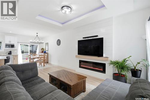 342 Sharma Crescent, Saskatoon, SK - Indoor Photo Showing Living Room With Fireplace
