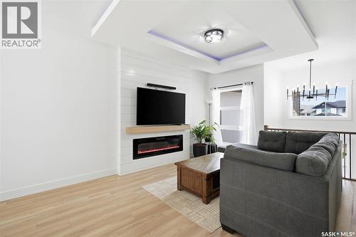 342 Sharma Crescent, Saskatoon, SK - Indoor Photo Showing Living Room With Fireplace