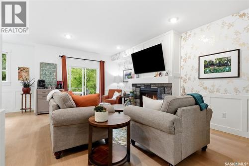 147 3220 11Th Street, Saskatoon, SK - Indoor Photo Showing Living Room With Fireplace