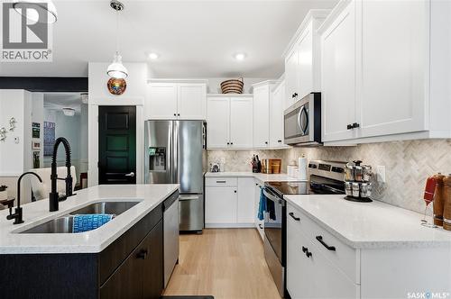 147 3220 11Th Street, Saskatoon, SK - Indoor Photo Showing Kitchen With Double Sink With Upgraded Kitchen