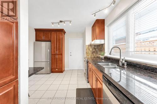 4230 Bloor Street W, Toronto, ON - Indoor Photo Showing Kitchen With Double Sink