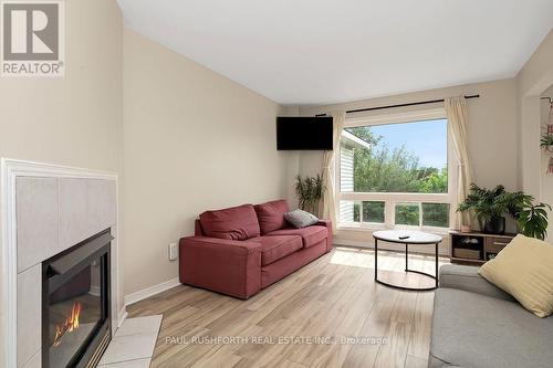 Living Room - 92 Splinter Crescent, Ottawa, ON - Indoor Photo Showing Living Room With Fireplace