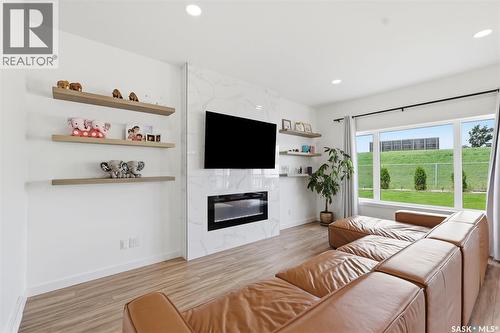 421 Germain Manor, Saskatoon, SK - Indoor Photo Showing Living Room With Fireplace