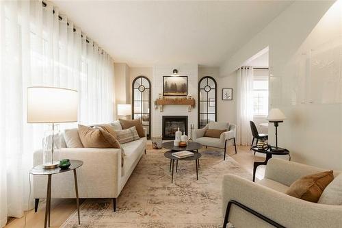 575 Renfrew St, Winnipeg, MB - Indoor Photo Showing Living Room With Fireplace