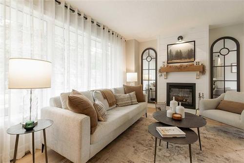 575 Renfrew St, Winnipeg, MB - Indoor Photo Showing Living Room With Fireplace