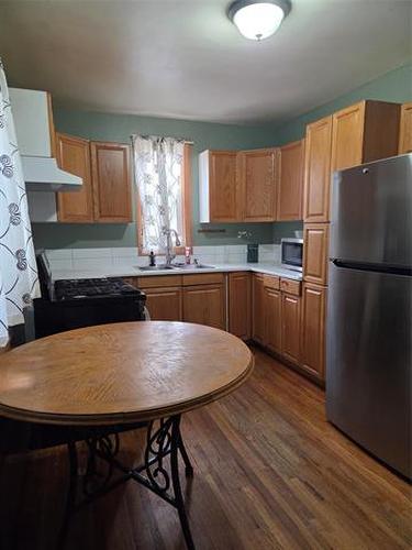 674 Church Ave, Winnipeg, MB - Indoor Photo Showing Kitchen With Double Sink