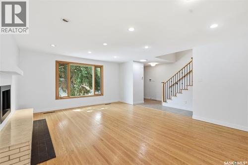 709 Cumberland Avenue S, Saskatoon, SK - Indoor Photo Showing Living Room With Fireplace