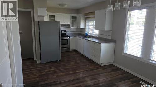 215 Central Street W, Warman, SK - Indoor Photo Showing Kitchen With Double Sink