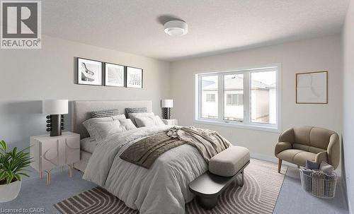 Carpeted flooring, white walls, large window with white trim, flush-mount ceiling light - 16 Monteith Drive, Brantford, ON - Indoor Photo Showing Bedroom