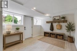 AI staged Lower level Mudroom (separate entrance) - 