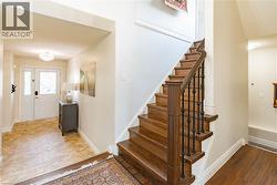Wood staircase with wrought iron balusters - 