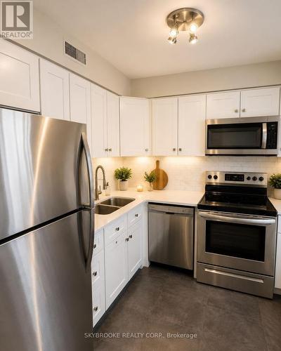 7 - 48 Loggers Run, Barrie, ON - Indoor Photo Showing Kitchen With Double Sink