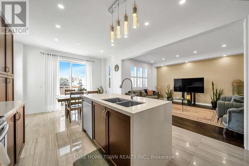 19 Findlay Way, Centre Wellington, ON - Indoor Photo Showing Kitchen With Double Sink