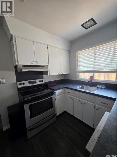262 Duncan Road, Estevan, SK - Indoor Photo Showing Kitchen With Double Sink