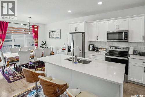 138 Rosewood Boulevard E, Saskatoon, SK - Indoor Photo Showing Kitchen With Double Sink With Upgraded Kitchen