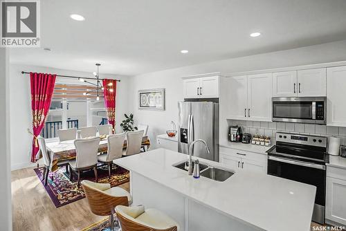 138 Rosewood Boulevard E, Saskatoon, SK - Indoor Photo Showing Kitchen With Double Sink With Upgraded Kitchen
