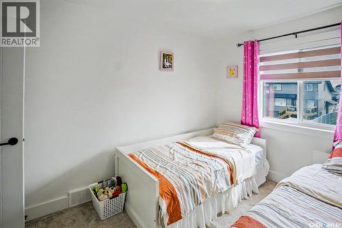138 Rosewood Boulevard E, Saskatoon, SK - Indoor Photo Showing Bedroom