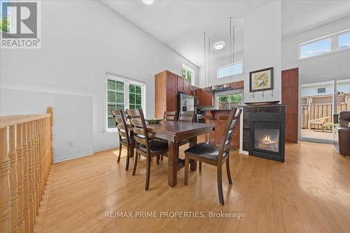 201 Gladeview Private, Ottawa, ON - Indoor Photo Showing Dining Room With Fireplace