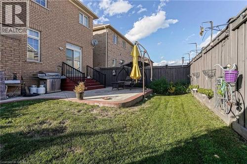 Fenced backyard featuring a patio - 3 Coolwater Drive Unit# Upper, Brampton, ON - Outdoor With Deck Patio Veranda