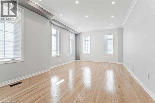 Spare room featuring crown molding, light wood-style floors, and recessed lighting - 3 Coolwater Drive Unit# Upper, Brampton, ON - Indoor Photo Showing Other Room