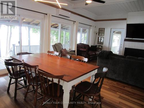 Dining Room with walkout to Covered Lakeside Porch - 6576 Quarry Point Road, Ramara, ON - Indoor Photo Showing Dining Room