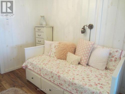 Daybed pulls out to King Size Bed - 6576 Quarry Point Road, Ramara, ON - Indoor Photo Showing Bedroom