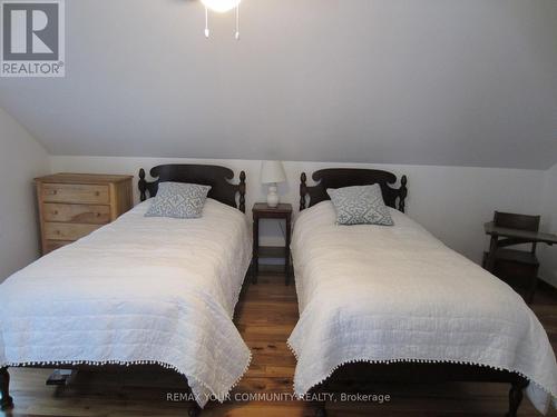 Twin Beds and 3 windows - 6576 Quarry Point Road, Ramara, ON - Indoor Photo Showing Bedroom