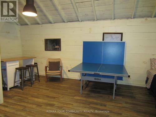 Games Area/Bar and Stools - 6576 Quarry Point Road, Ramara, ON - Indoor Photo Showing Other Room
