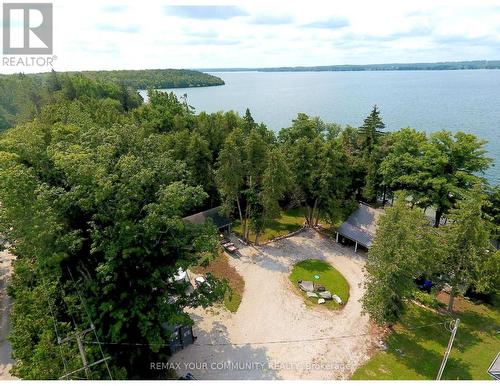 Overview of property from Road - 6576 Quarry Point Road, Ramara, ON - Outdoor With Body Of Water With View