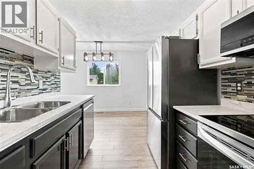 118 Dundurn Place, Saskatoon, SK - Indoor Photo Showing Kitchen With Double Sink