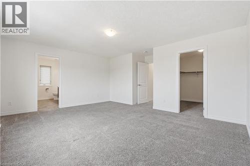Large primary with 4 piece en suite and walk in closet - 359 Beechdrops Drive, Waterloo, ON - Indoor Photo Showing Other Room