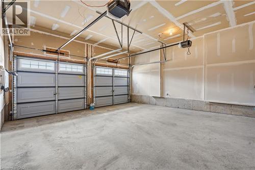 Large double car garage - 359 Beechdrops Drive, Waterloo, ON - Indoor Photo Showing Garage
