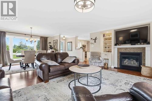 84 Turtle Path, Ramara, ON - Indoor Photo Showing Living Room With Fireplace