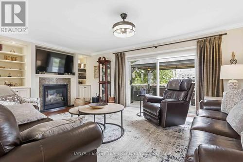 84 Turtle Path, Ramara, ON - Indoor Photo Showing Living Room With Fireplace