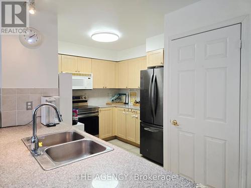 207 - 5940 Yonge Street, Toronto, ON - Indoor Photo Showing Kitchen With Double Sink
